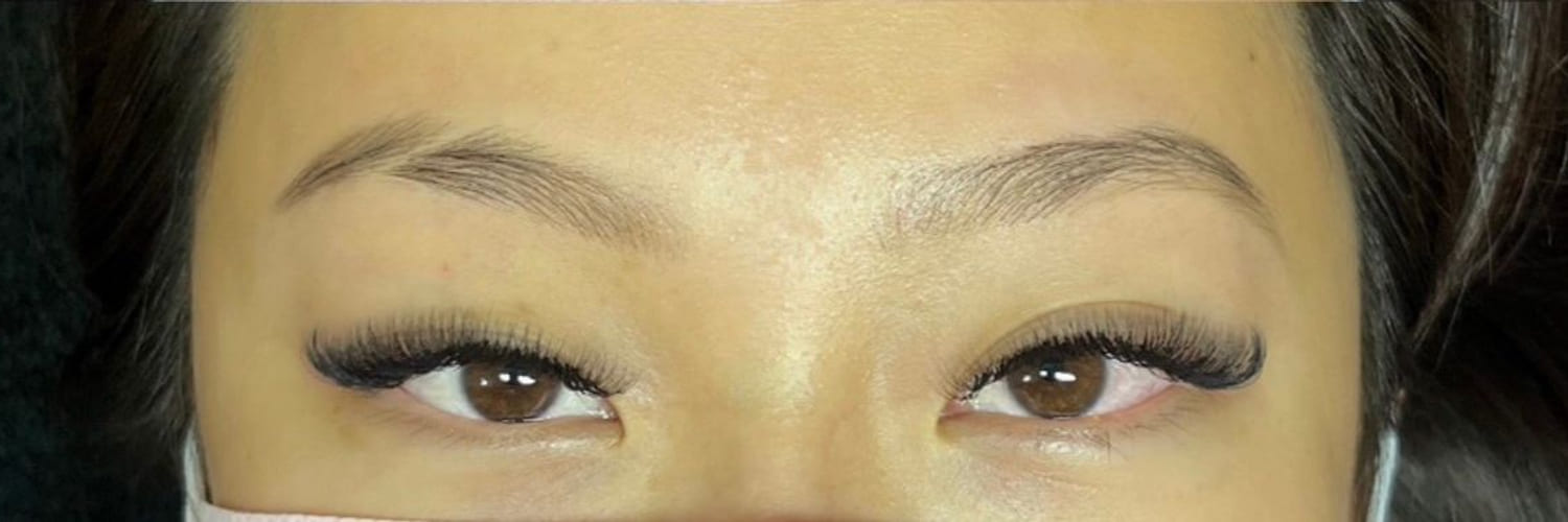 Lash extensions with shaped, tinted brows after treatment